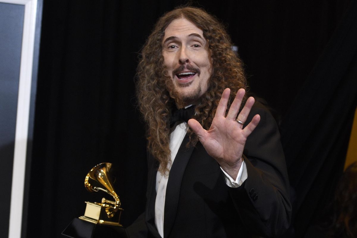 “Weird Al” Yankovic poses in the press room with the award for best boxed or special limited-edition package for “Squeeze Box: The Complete Works of ‘Weird Al’ Yankovic” at the 61st Annual Grammy Awards at the Staples Center on  Feb. 10 in Los Angeles. (Chris Pizzello / Chris Pizzello/Invision/AP)