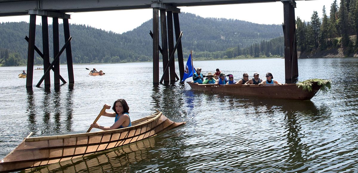 Coeur d’Alene tribe member Kodamen Matheson, front, is among the escorts paddling a Sturgeon nose canoe during the first leg of the tribe’s journey on Tuesday. Members launched their dug-out canoe made from an old-growth cedar log from Lake Coeur d’Alene near Heyburn State Park, and plan to meet up with the Upper Columbia United Tribes  at Kettle Falls on June 17. (Kathy Plonka / The Spokesman-Review)