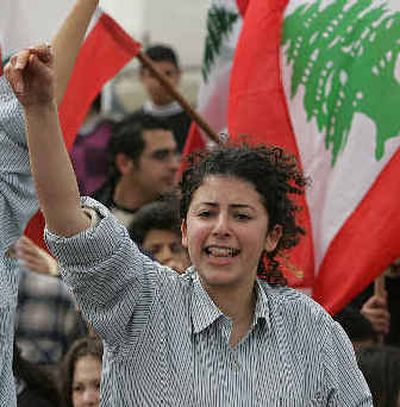 
A Lebanese student shouts anti-Syrian slogans on Tuesday, a day after the Lebanese government resigned. 
 (Associated Press / The Spokesman-Review)