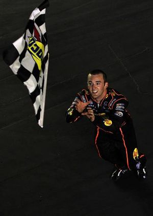 Austin Dillon, driver of the #3 Bass Pro Shops Chevrolet, celebrates with the checkered flag after winning the NASCAR Nationwide Series Feed The Children 300 at Kentucky Speedway on June 29, 2012, in Sparta, Ky. (Photo Credit: Chris Trotman/Getty Images) (Chris Trotman / Getty Images North America)