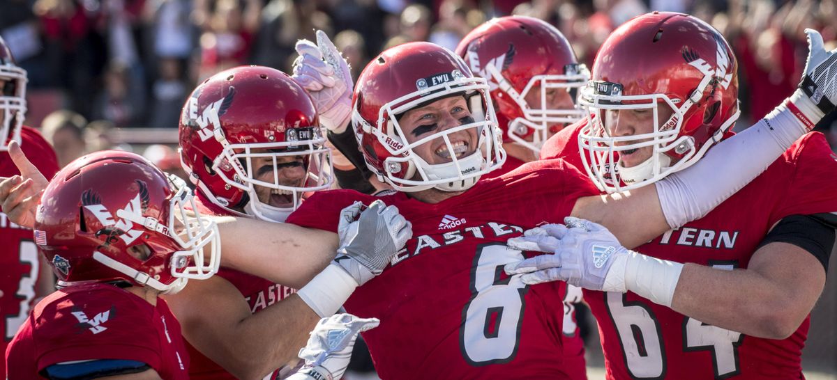 Eastern Washington quarterback Gage Gubrud (8) celebrates scoring the Eagles second touchdown during the first quarter of a college football game, Sat., Sept. 30, 2017, in Cheney, Wash. (Colin Mulvany / The Spokesman-Review)
