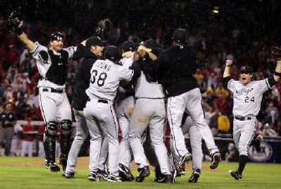 
The Chicago White Sox celebrate after beating the Los Angeles Angels 6-3 to win the American League pennant.
 (Associated Press / The Spokesman-Review)