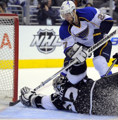 Los Angeles Kings goalie Jonathan Quick turned away 23 shots, including this attempt by St. Louis defenseman Alex Pietrangelo. (Associated Press)