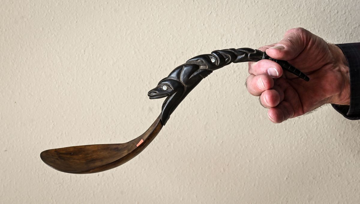 Bruce Ottmar displays a favorite items of his, an American Indian artifact ladle made of mountain goat (handle) and mountain sheep. from the Pacific Northwest. He also has a collection of artifacts dug by Native Americans from the permafrost on an island between Alaska and Russia. Some items are over 1,000 years old  (DAN PELLE/THE SPOKESMAN-REVIEW)