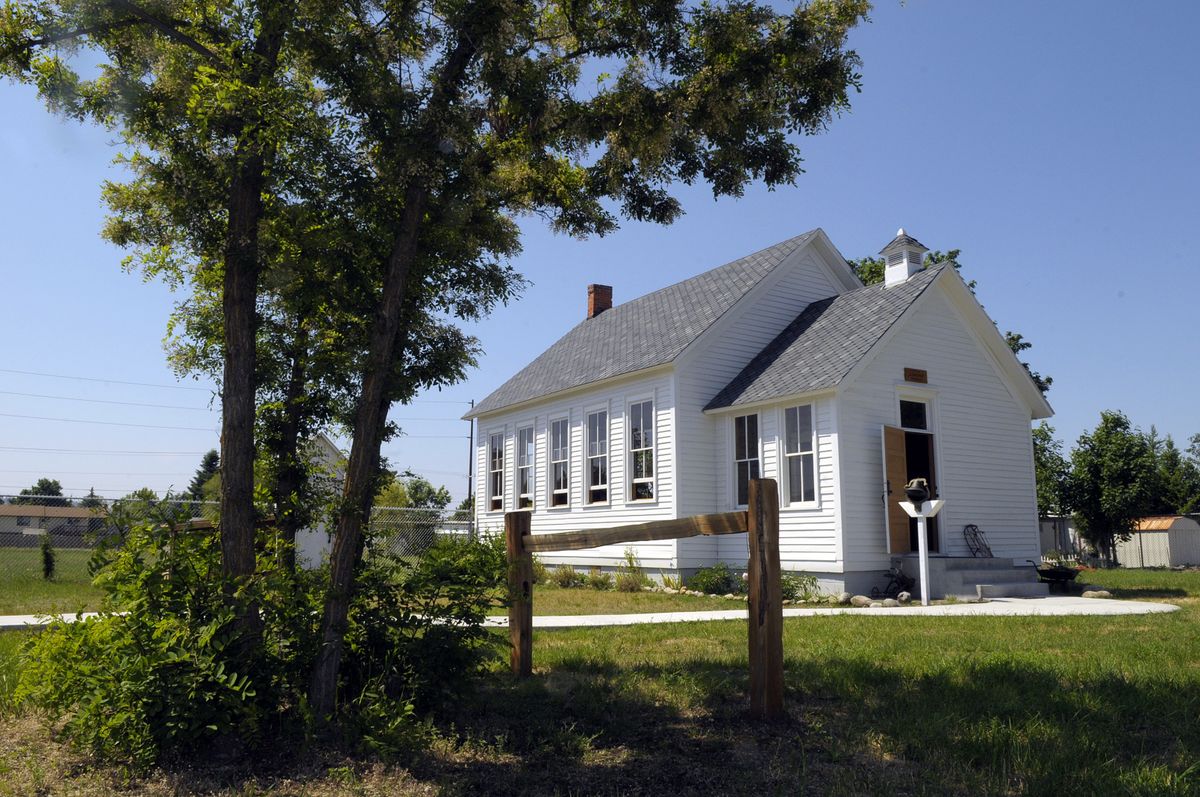 The Lone Fir one room schoolhouse that sits behind Jennifer’s Auto Sales on East Sprague has been restored to almost original condition by the business. (CHRISTOPHER ANDERSON / The Spokesman-Review)