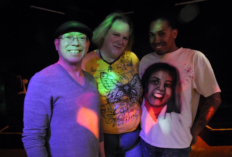 Robin Tuttle, center, of the Hollyrock Bar and Grill, is seen here with Jason Johnson, left, also known as drag queen Nova Kaine, and Freedom Rights, right. (J. Bart Rayniak)