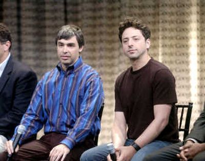 
Google co-founders Sergey Brin, right, and Larry Page are in the Forbes top 10 list for the first time. Associated Press
 (Associated Press / The Spokesman-Review)