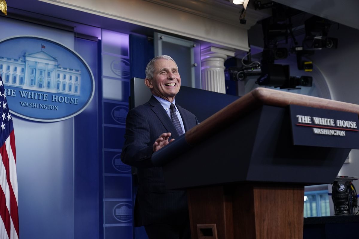 Dr. Anthony Fauci, director of the National Institute of Allergy and Infectious Diseases, laughs while speaking in the James Brady Press Briefing Room at the White House, Thursday, Jan. 21, 2021, in Washington.  (Alex Brandon)