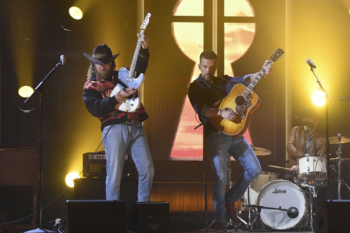 John Osborne, left, and T.J. Osborne, of Brothers Osborne, perform at the 56th annual Academy of Country Music Awards on Sunday, April 18, 2021, at the Ryman Auditorium in Nashville, Tenn.  (Amy Harris)