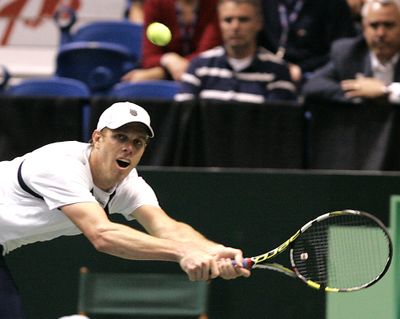 American Sam Querrey lunges to return a volley. (Associated Press)