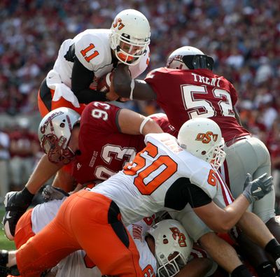 Washington State senior linebacker Greg Trent, right, said a foot injury won’t keep him from playing in front of family Saturday in Waco.  (Associated Press / The Spokesman-Review)