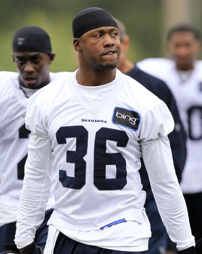 Pete Carroll says defensive back Lawyer Milloy ‘brings so much.’ (Associated Press)