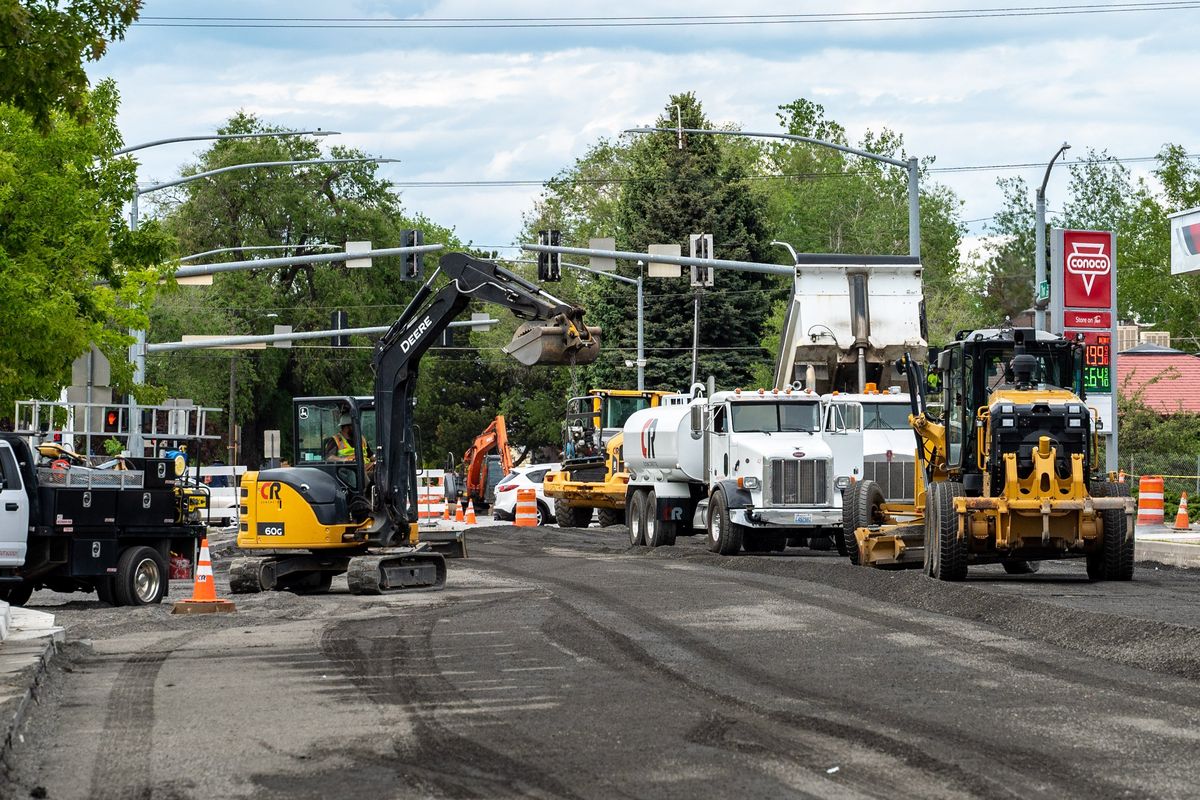 Crews are seen working on the Thor and Freya reconstruction project in this June 2022 photo. The roadway is back open after a disruptive construction season that prompted complaints from motorists and businesses, but the new concrete road should be more resilient and last longer, the city says.  (COLIN MULVANY/THE SPOKESMAN-REVIEW)