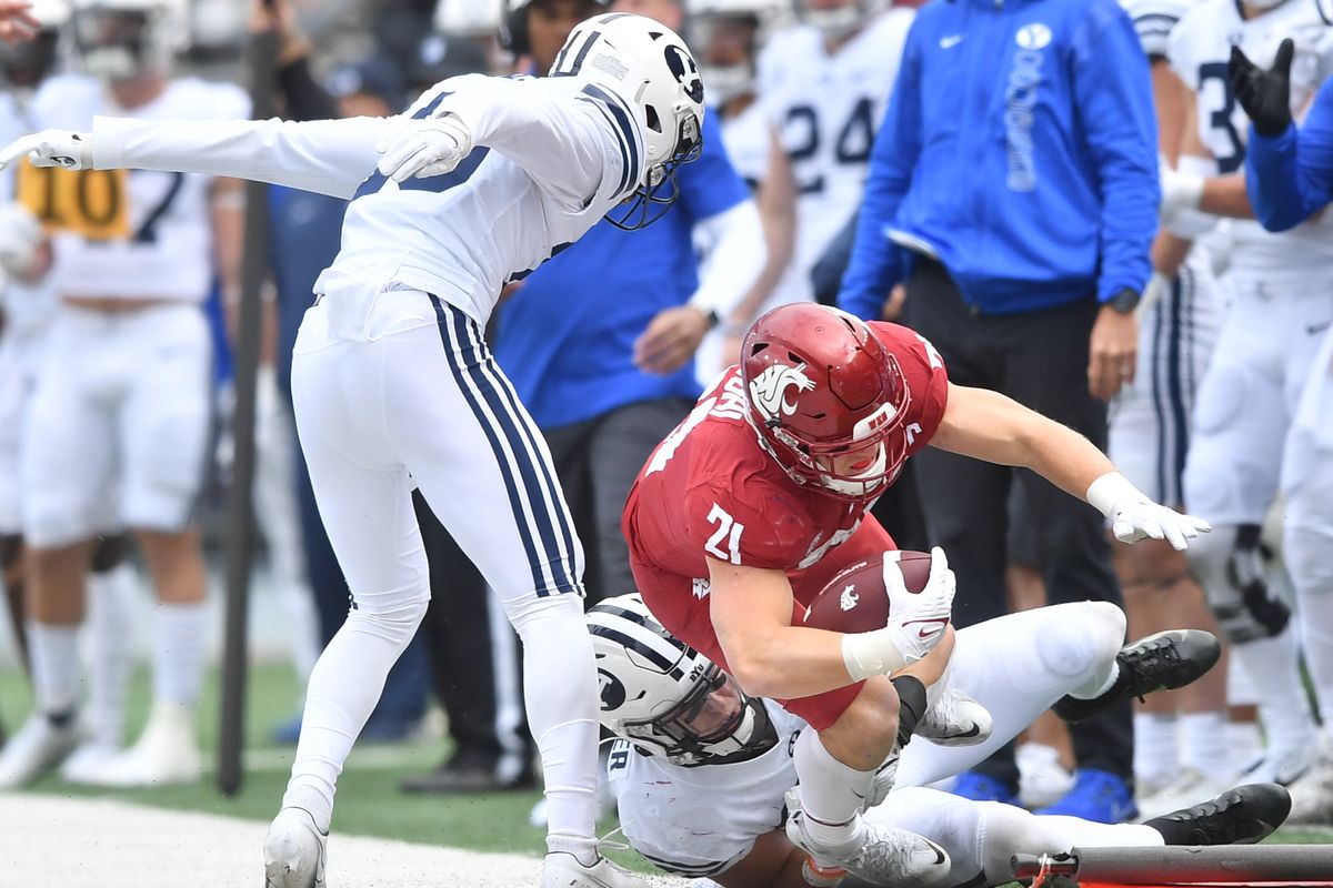 Washington State Cougars running back Max Borghi (21) runs the ball out of bounds against the Brigham Young Cougars during the first half of a college football game on Saturday, Oct 23, 2021, on Gesa Field in Martin Stadium in Pullman, Wash.  (Tyler Tjomsland/The Spokesman-Review)