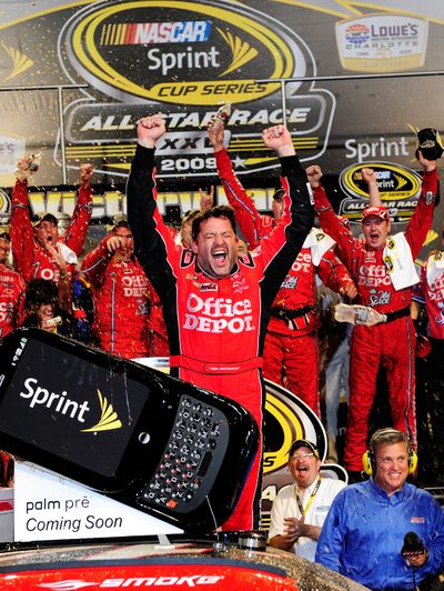 Tony Stewart celebrates winning the NASCAR Sprint All-Star Race, his first victory as a team owner. Stewart joined Geoffrey Bodine (1994) as the only two driver/owners to win the NASCAR Sprint All-Star Race. (Photo Credit: Rusty Jarrett/Getty Images for NASCAR)  (Rusty Jarrett / The Spokesman-Review)