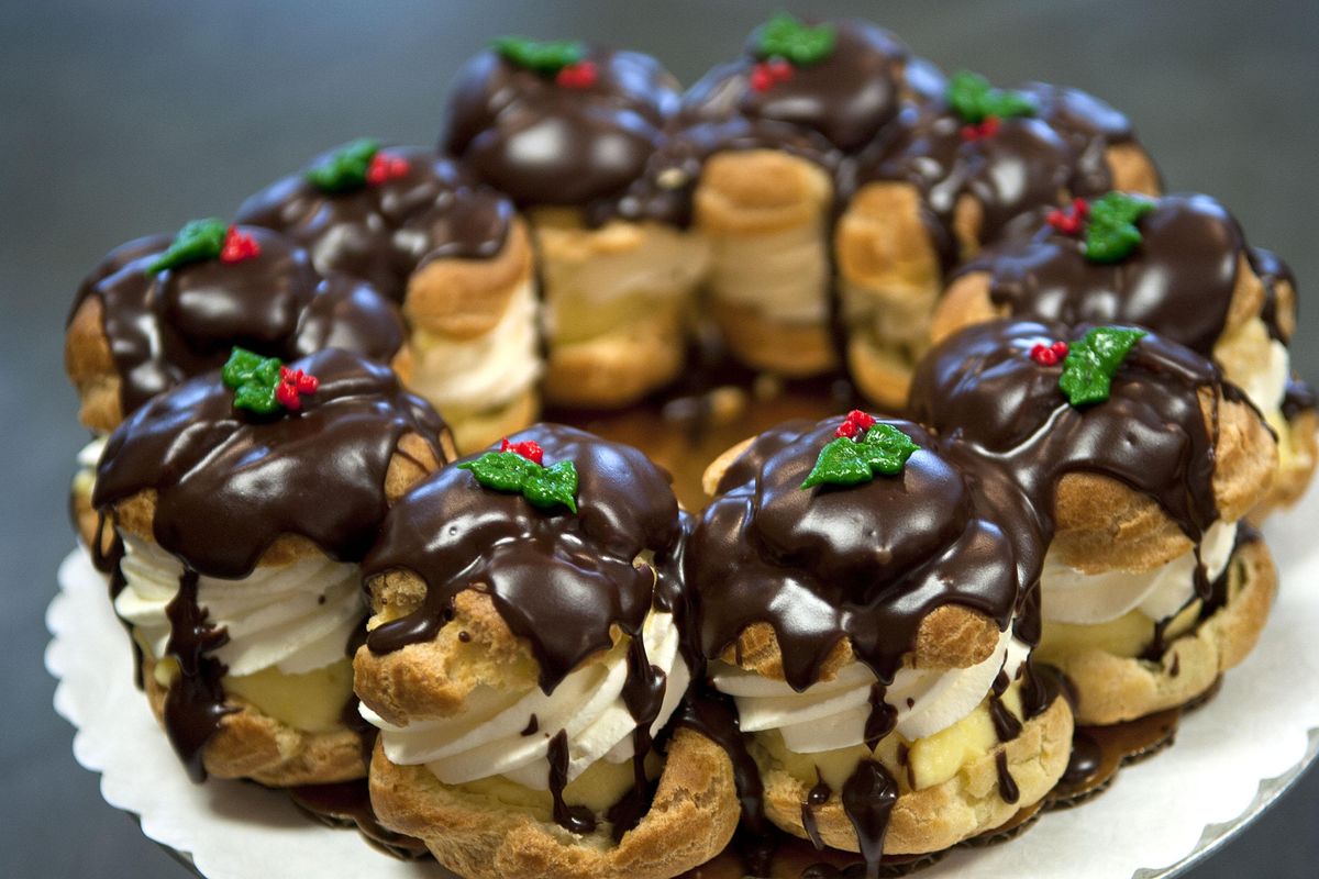 Just American Deserts has offered its signature cream-puff wreath for the holidays since the bake shop opened in 1986. (Kathy Plonka / The Spokesman-Review)