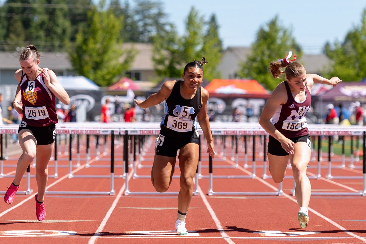Central Valley’s Davina Kostecka crosses the finish line first in the State 4A girls 100-meter hurdles prelims on Friday at Mount Tahoma High School in Tacoma. (Joshua Hart/For Spokesman-Review)
