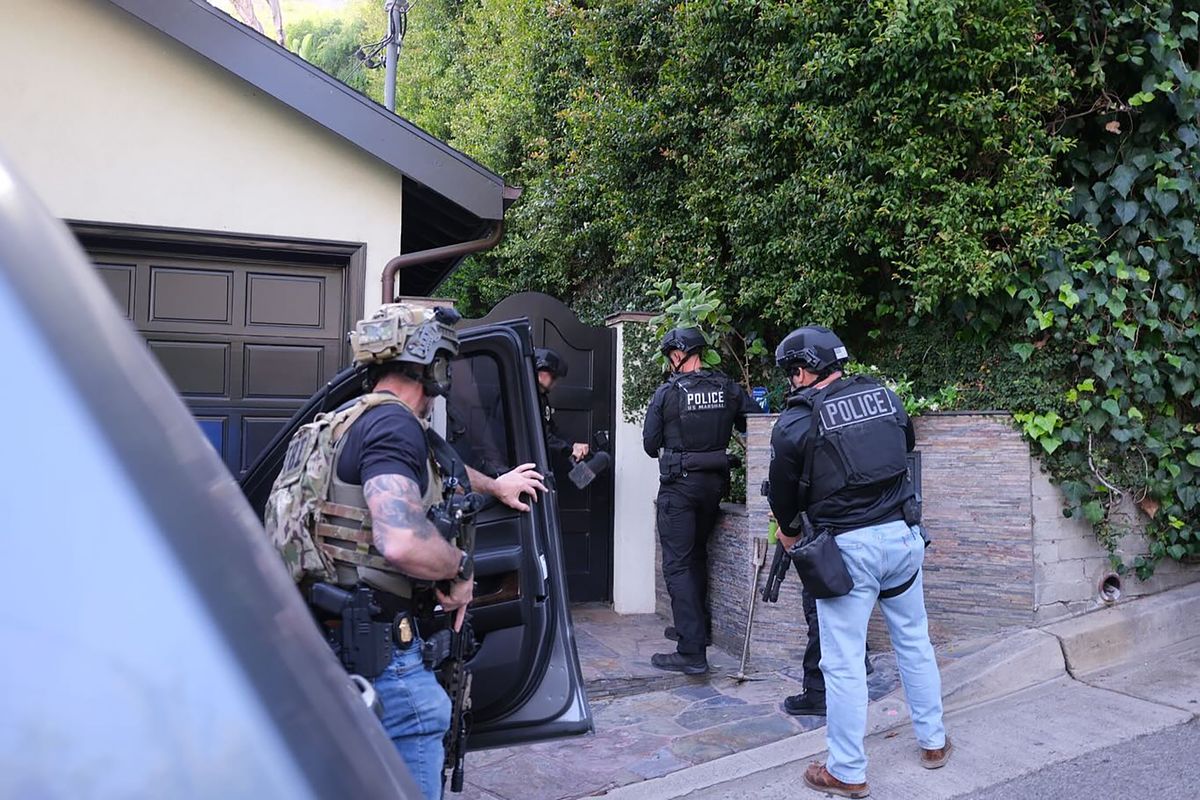 LAPD Robbery Homicide Division along with the assistance of Gang and Narcotics Division arrest David Burke in connection with the murder of Celeste Rivas. (LAPD/TNS)