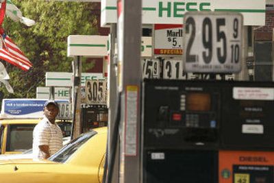 
Drivers pump gas in New York on Tuesday. A big jump in gasoline prices pushed inflation at the wholesale level up in March at the fastest pace in three months, as oil prices rise above $71 a barrel.  
 (Associated Press / The Spokesman-Review)