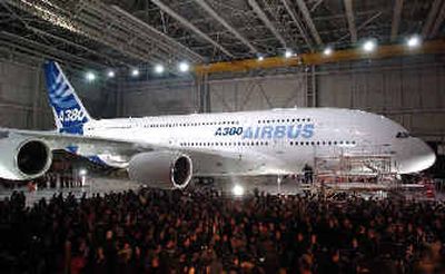 
A crowd gathers at the unveiling of the new Airbus A380 superjumbo jetliner last month in Toulouse, France.
 (Associated Press / The Spokesman-Review)