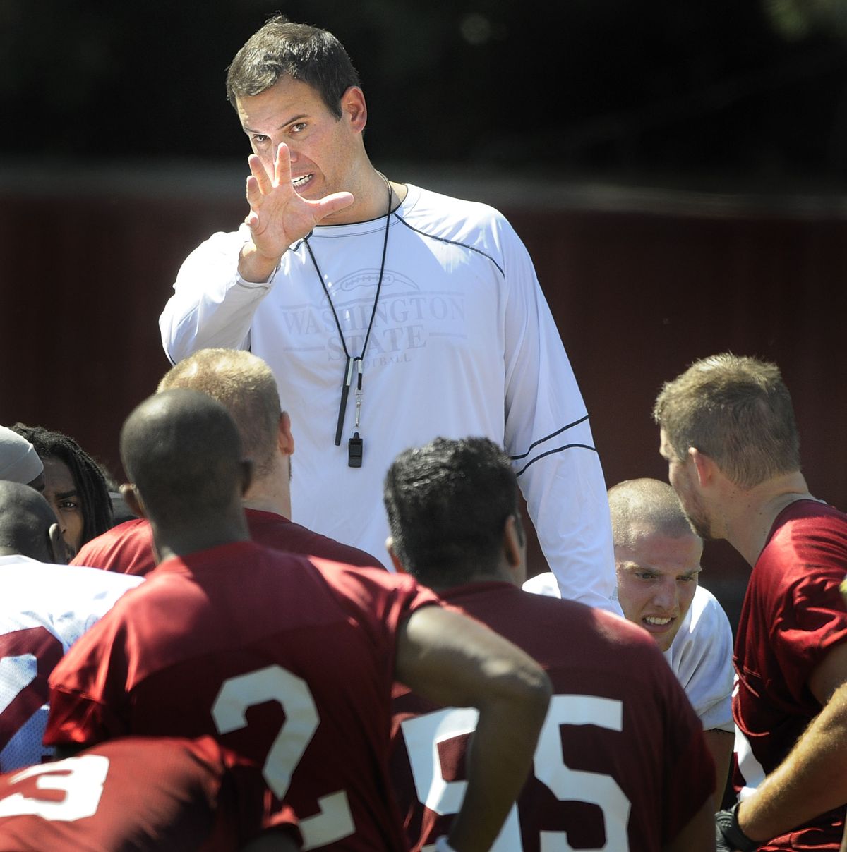 Coach Paul Wulff and his players open the season Saturday at Seattle against Oklahoma State. The Cougars were 5-7 last season. (Christopher anderson / The Spokesman-Review)