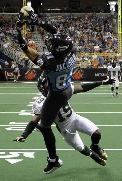 Offensive player of the game Chris Jackson (WSU) catches one of his three scores.  (Associated Press / The Spokesman-Review)