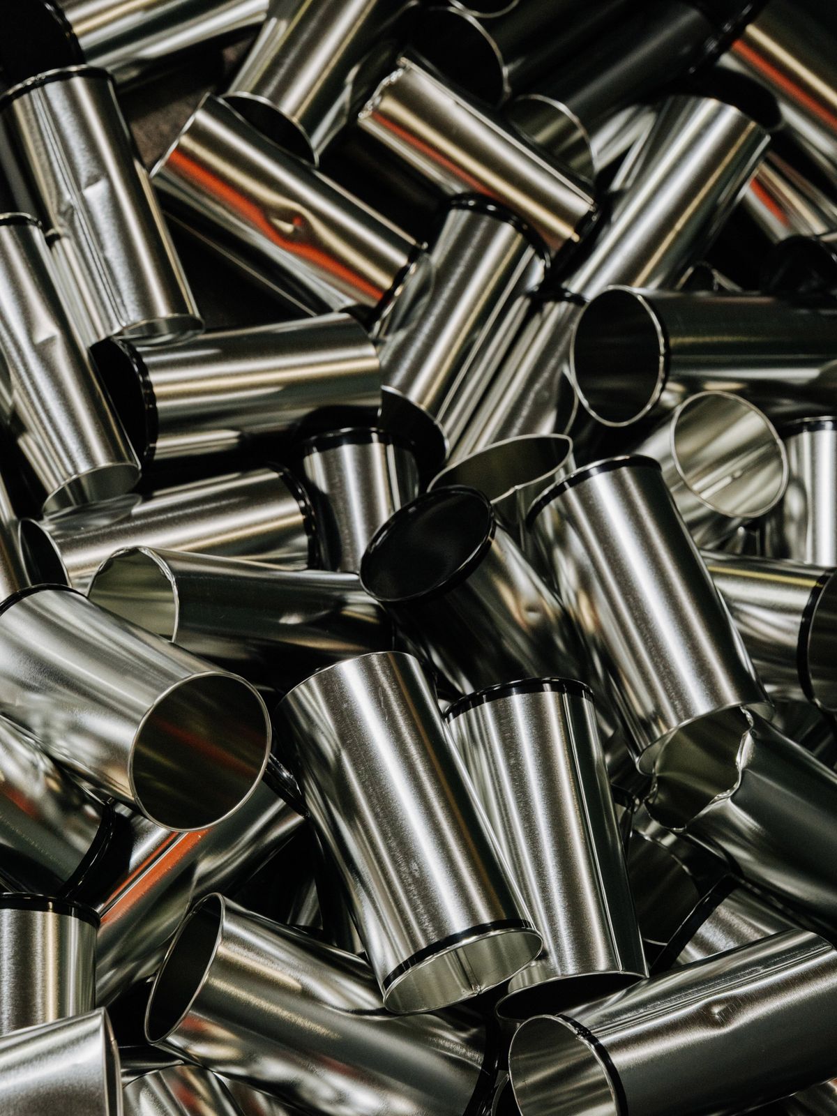 Tin-plated steel cans, made of steel with a thin layer of tin that mostly comes from abroad, at the Independent Can Co., in Belcamp, Md., on June 13. Food and beverage companies say new tariffs on steel and aluminum will raise the cost of their containers, which means consumers are likely to pay the difference. (CAROLINE GUTMAN/New York Times)