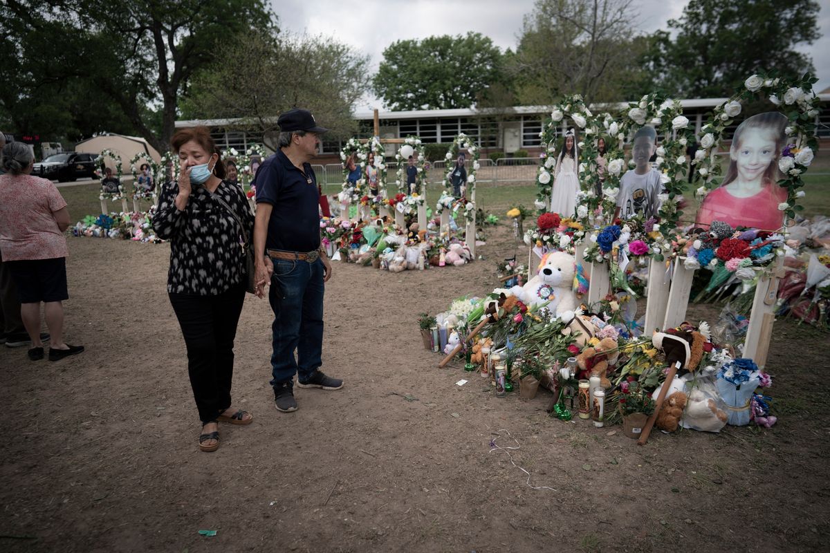 People visit a memorial outside Robb Elementary School in Uvalde, Texas, Monday, May 30.  (Wong Maye-E)