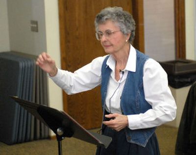 
Lois Iller directs the hand bell choir at Riverview Retirement Community. Iller has many years of experience as a hand-bell conductor at a North Side church.
 (Dan Pelle / The Spokesman-Review)
