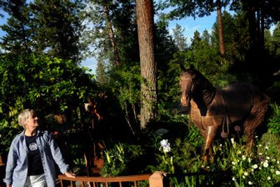 
Nancy Santschi-Apodaca, her steel horse and Abracadabra Alacazam Garden will be part of the Spokane in Bloom Magical Mystery garden tour. 
 (Rajah Bose / The Spokesman-Review)