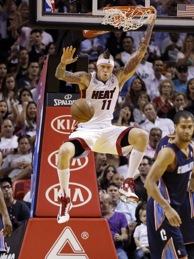 Miami's Chris Anderson adds some emphasis on a second-half dunk as the Heat stretched their winning-streak to 26 games. (Associated Press)