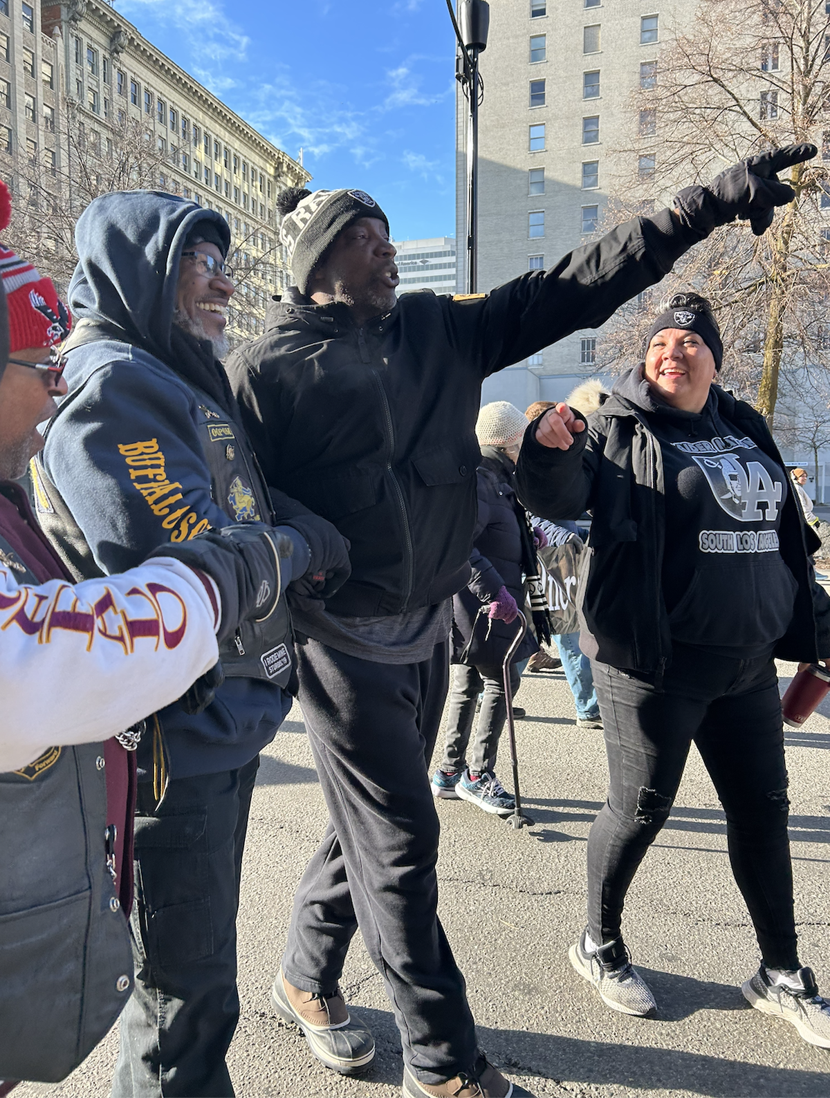 Kemo Patrick and Rose McCollum talk with a Buffalo Solider member during the march.  (April Eberhardt/The Black Lens)