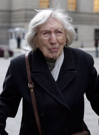 Miriam Moskowitz, 98, leaves federal court in New York on Thursday after a judge rejected her request to erase her 1950 conviction for conspiracy to obstruct justice. (Associated Press)