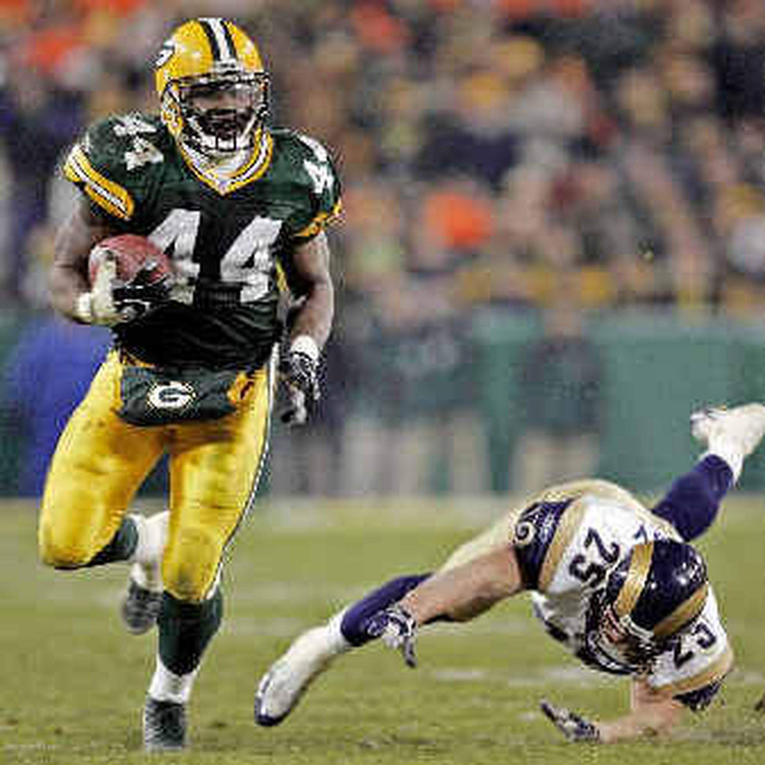 Bubba Franks of the Green Bay Packers is tackled after an eight yard