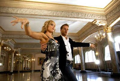 
Irina Boubnovskaia and Louis vanAmstel  dance in the Isabella Ballroom at the Davenport Hotel on Thursday during the filming of the 