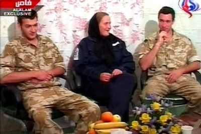 
An image taken from Iranian television Friday shows  British service personnel, from left, Nathan Thomas Summers, Faye Turney and an unidentified man. The three were among 15 sailors and marines captured by Iranians for allegedly trespassing in Iranian waters.  
 (Associated Press / The Spokesman-Review)