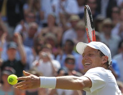 Tomas Berdych is all smiles after ousting Roger Federer. (Associated Press)