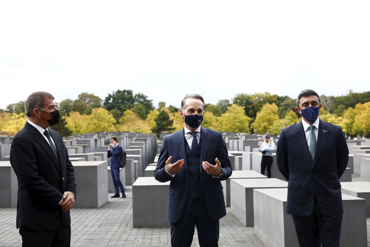 German Foreign Minister Heiko Maas, center, visits with his counterparts from Israel Gabi Ashkenazi, left, and the United Arab Emirates Sheikh Abdullah bin Zayed Al Nahyan the Holocaust Memorial during a meeting in Berlin, Germany, Tuesday, Oct. 6, 2020. The three foreign minister meet for talks in the German capital. (Michele Tantussi)