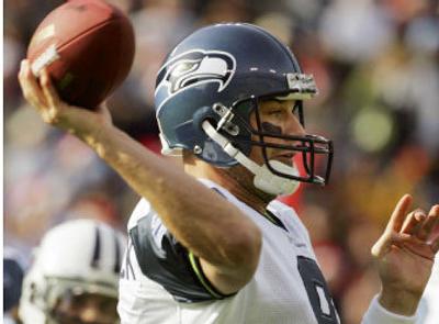 
Seattle's Matt Hasselbeck has been effective at home, completing nearly 65 percent of his passes while winning 20 of his past 24 games in Seattle. Since 1994, 19 of 22 NFC teams have won second-round home playoff games. 
 (Associated Press / The Spokesman-Review)