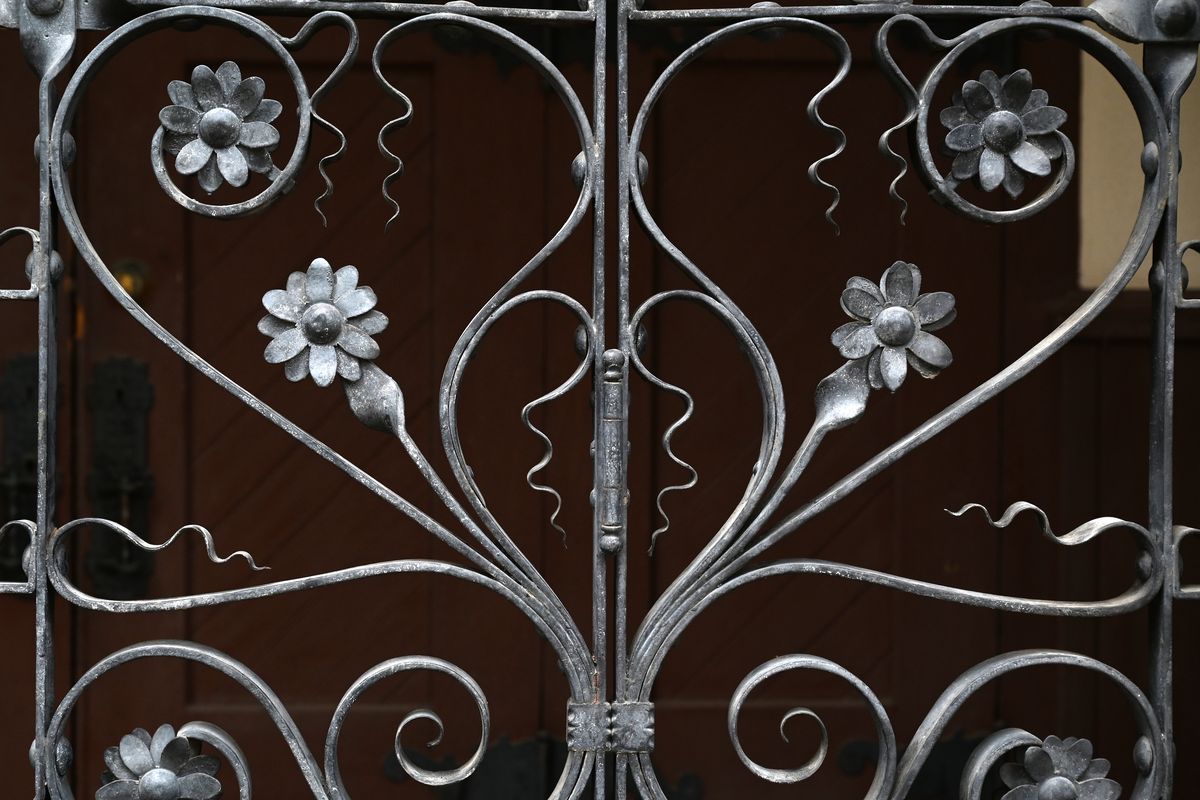 This is a detail of the wrought iron gate on a rock chapel designed by architect Kirtland Cutter at Fairmount Memorial Park.  (Jesse Tinsley/The Spokesman-Review)