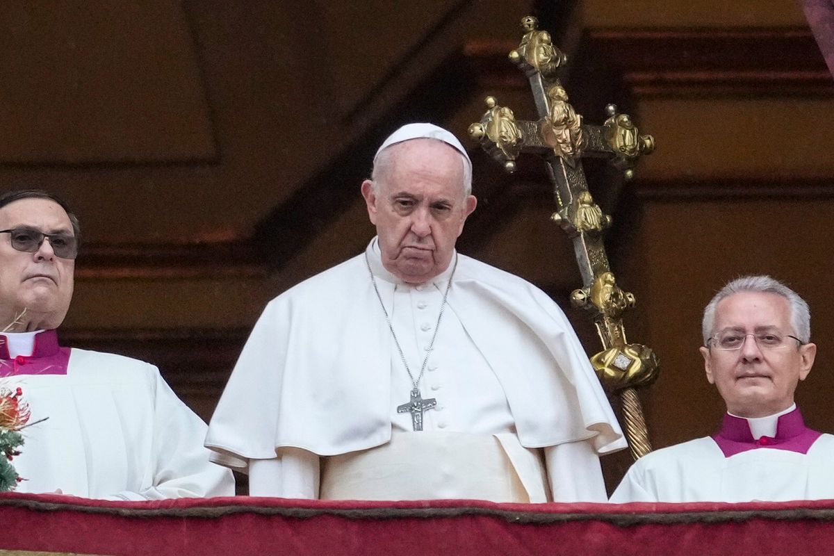 Pope Francis looks at the crowd after delivering the Urbi et Orbi (Latin for 