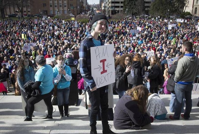 Rae Schalk said her sign simply symbolized her thoughts. “Every day there’s a prime opportunity for someone to come into a classroom and kill me and my friends,” the 16-year-old sophomore at Centennial High said. (Idaho Statesman / Katherine Jones)