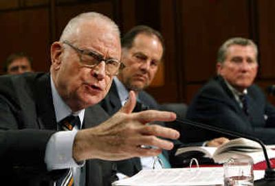 
Sept. 11 commission Vice Chairman Lee Hamilton, left, Thomas Kean, center, commission chairman, and Commissioner John Lehman, right, testify before the Senate Intelligence Committee Open Hearing about commission recommendations on Tuesday. 
 (Associated Press / The Spokesman-Review)