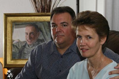 
John and Stacey Holley, with a portrait of their son Matthew Holley, who was killed in Iraq in 2005.
 (Associated Press / The Spokesman-Review)