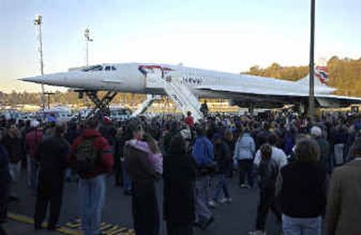 
Sightseers get a close-up look at a British Airways supersonic Concorde that landed at Boeing Field  last November. The jet, which flew in from New York, is part of the Museum of Flight.
 (Associated Press / The Spokesman-Review)