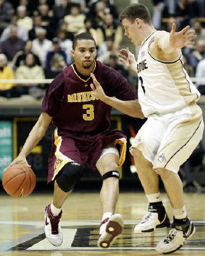 
Kevin Payton and Minnesota have lost a school-record 21 games.  
 (Associated Press / The Spokesman-Review)