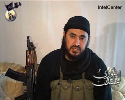 
In this video image posted Tuesday on the Internet, al-Qaida in Iraq leader Abu Musab al-Zarqawi accuses the West and the United States of waging a 