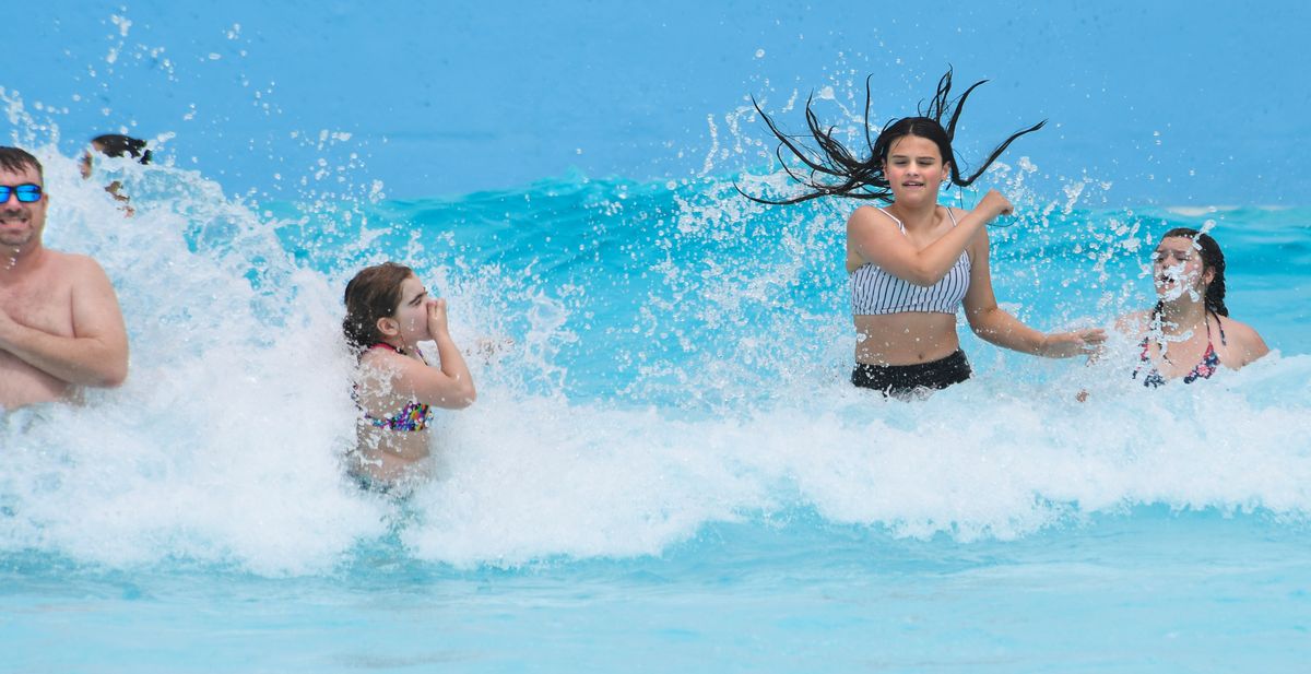 The Boulder Beach wave pool pounds swimmers on the opening day at Silverwood Theme Park on May 30 (Dan Pelle/The Spokesman-Review)