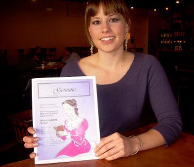 
Eryn Denison holds a copy of the first issue of Genuine magazine. 
 (Cindy Hval / The Spokesman-Review)