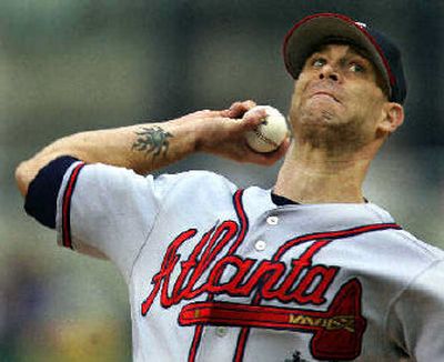 
Atlanta's Tim Hudson, pitching earlier this month, must rest a strained left side. 
 (Associated Press / The Spokesman-Review)